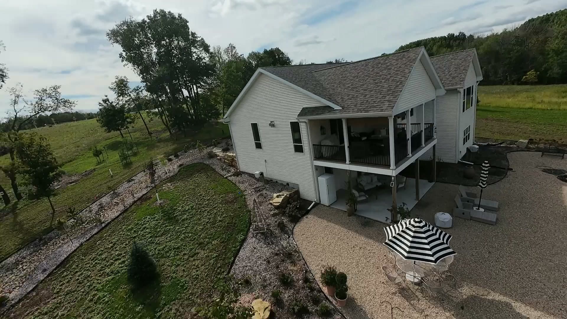 Dutch Hollow home and screened porch beside meadows and woods