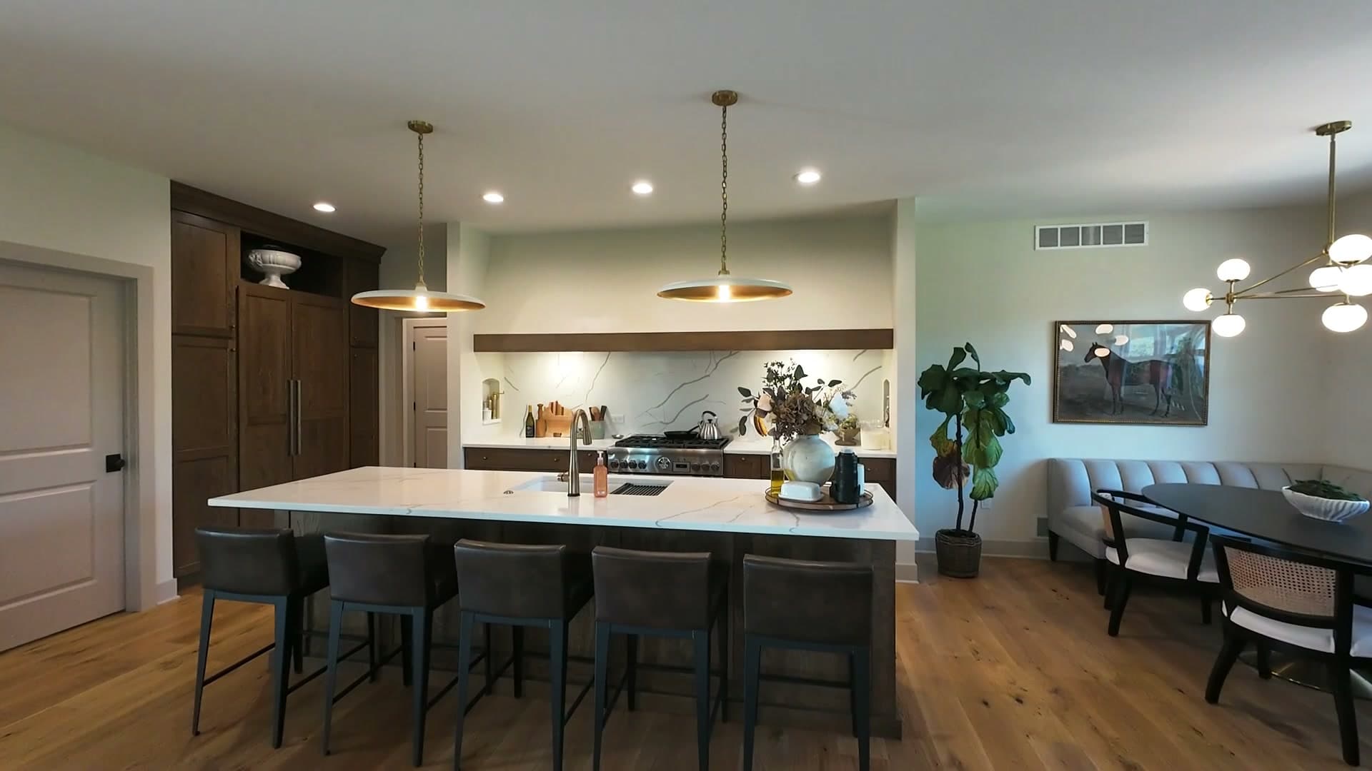 White oak kitchen and dining area inside the Dutch Hollow home