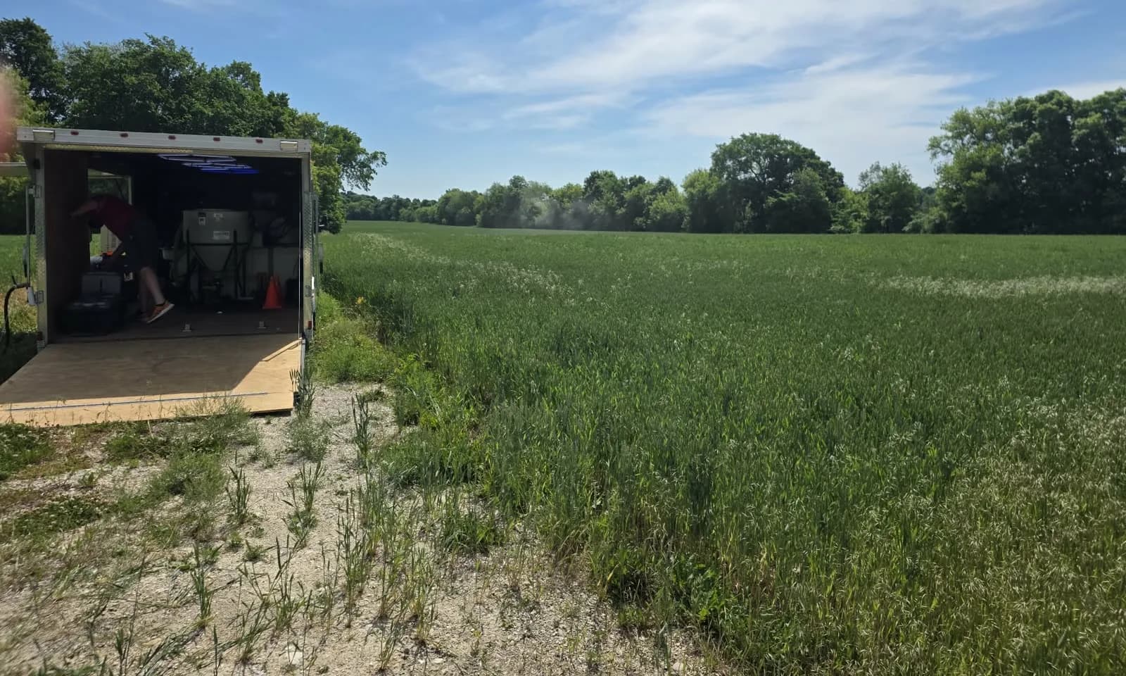 Field support setup beside agriculture equipment